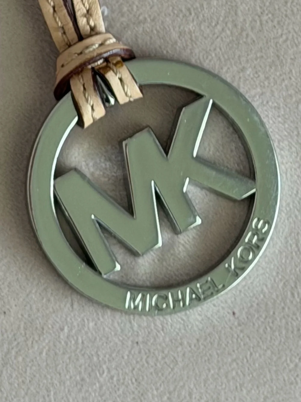 Michael Kors Tan Leather Strap with Silver MK Logo Charm